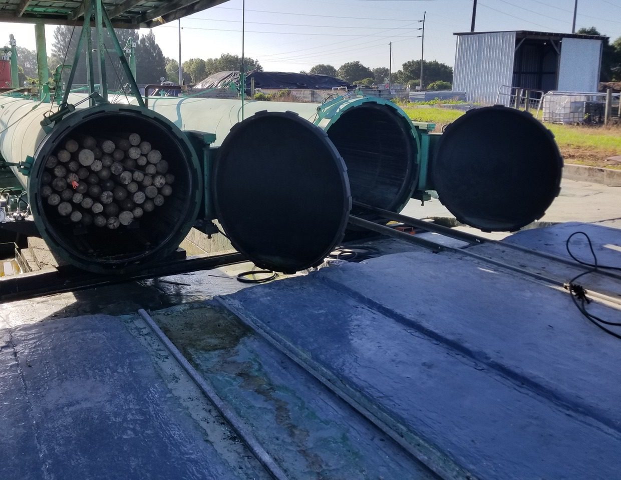 Pressure Treating Poles & Dock Piling | The Supply Scout
